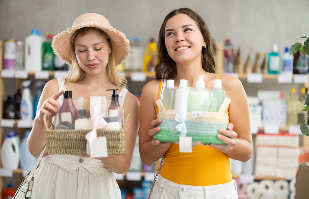 Women friends choose cosmetics gift set
