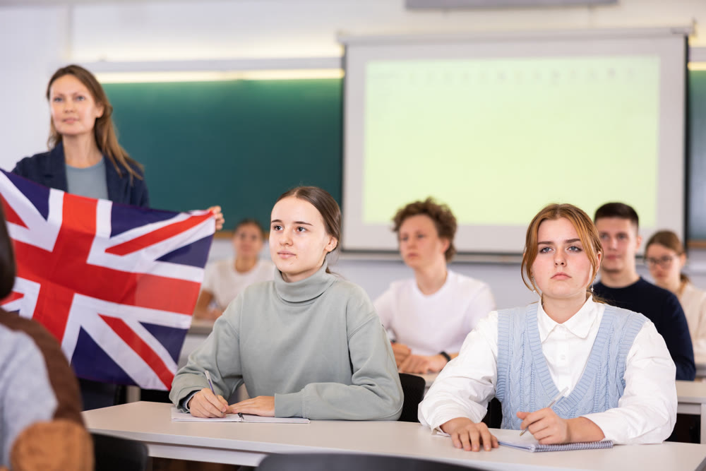 Young girls students study diligently at school