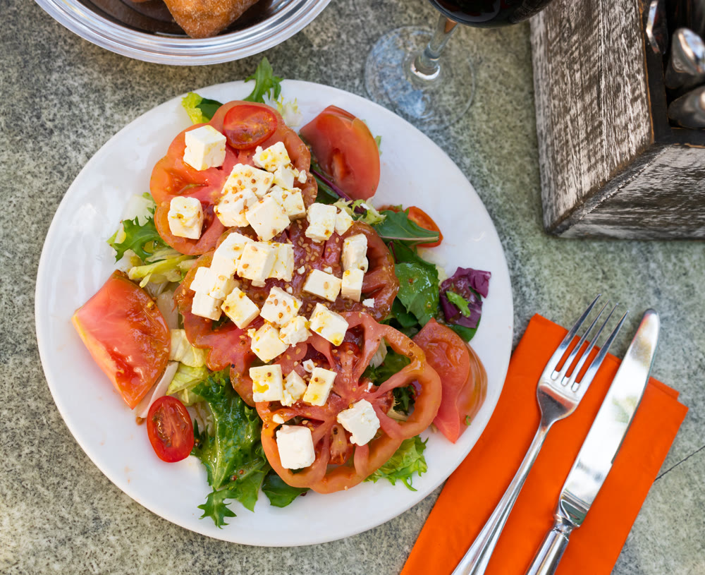 Tomato salad with cheese and olives