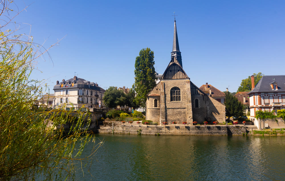 Medieval church of Saint-Maurice on bank of Yonne river in Sens