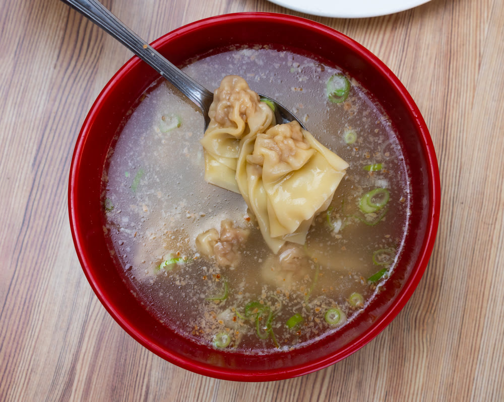 Wonton soup is cooked dumplings filled with meat or seafood. They are served in broth, usually enriched with onions and other ingredients. Chinese cuisine