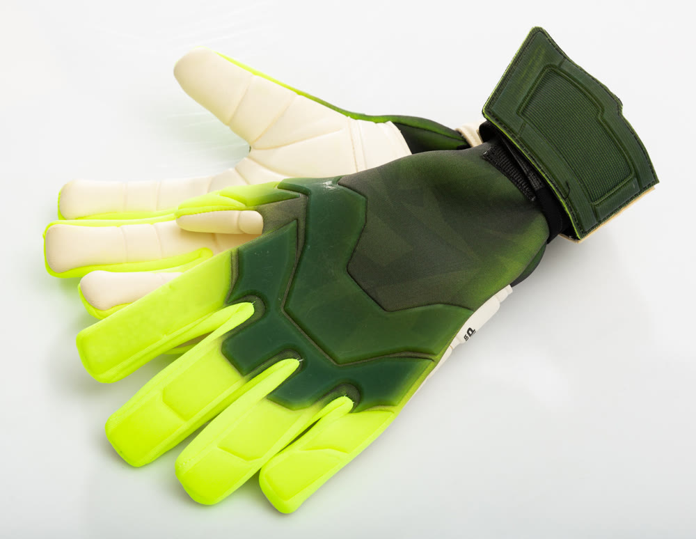 Pair of goalkeeper gloves isolated on white background