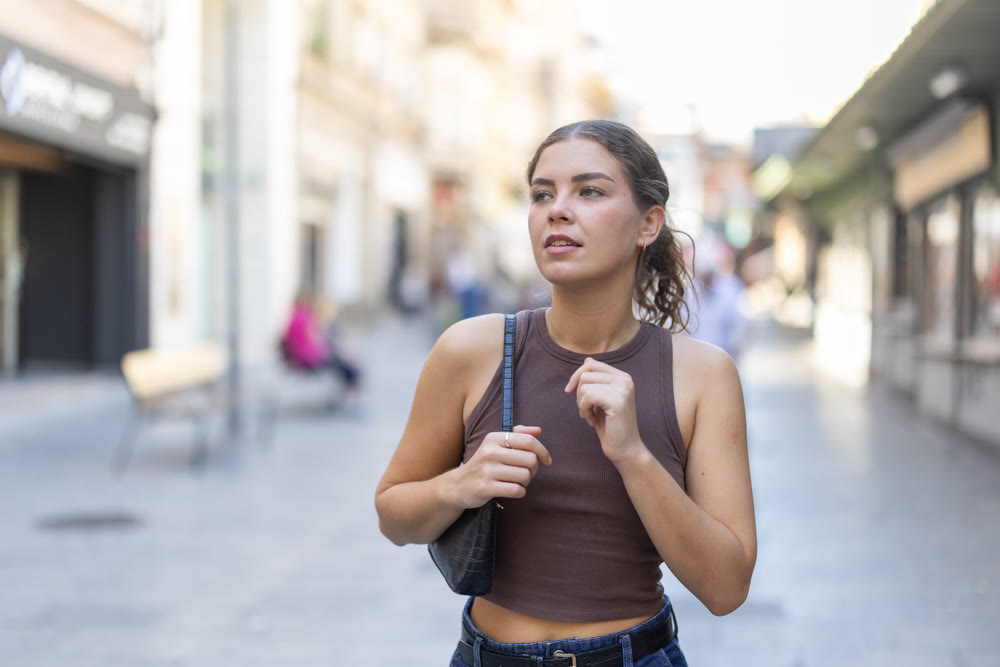 Girl walks around city district