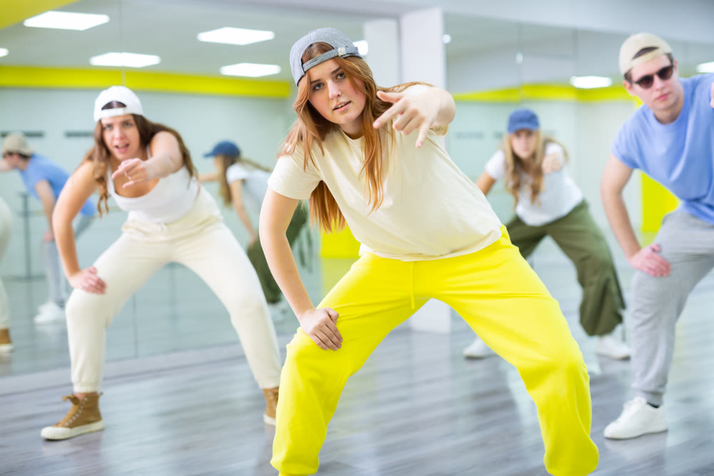 Dance class for teenages, girl and boy training in dance studio