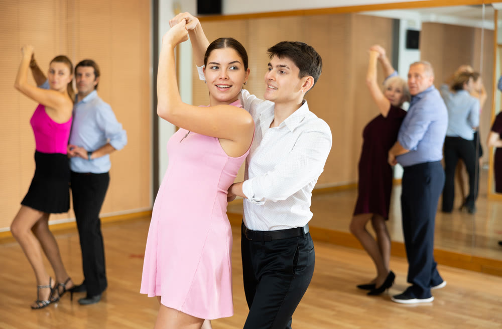young women with partner dance samba